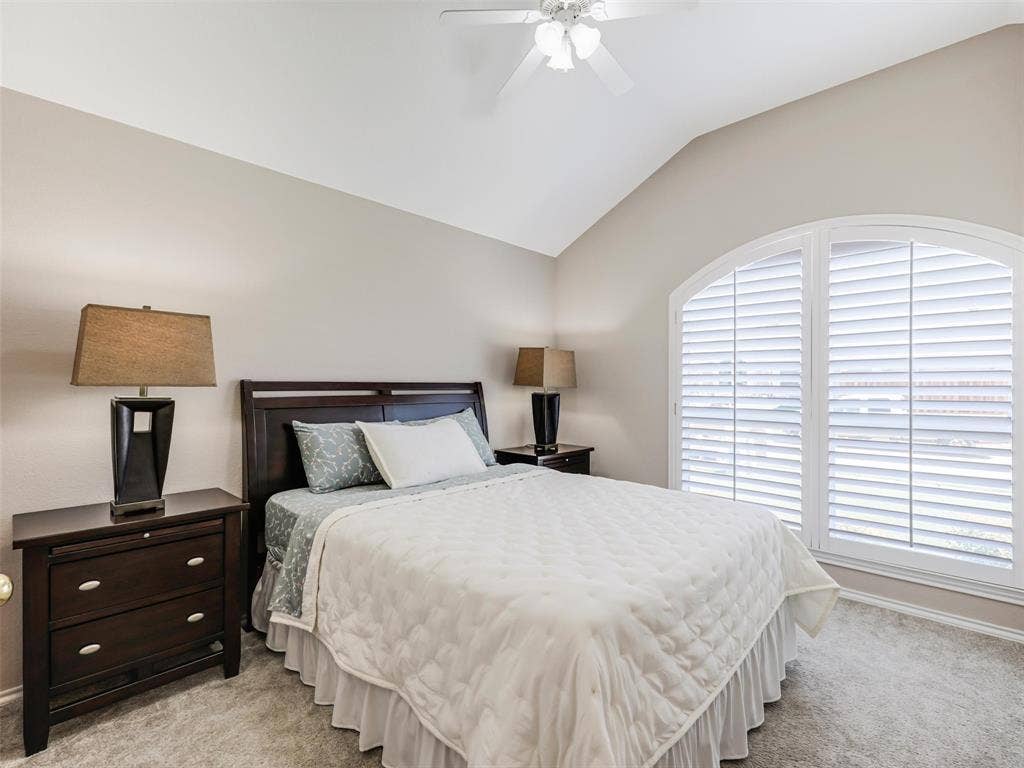 2109 Lilac Circle, McKinney, TX 75071 Guest bedroom has plantation shutter and walk-in closet