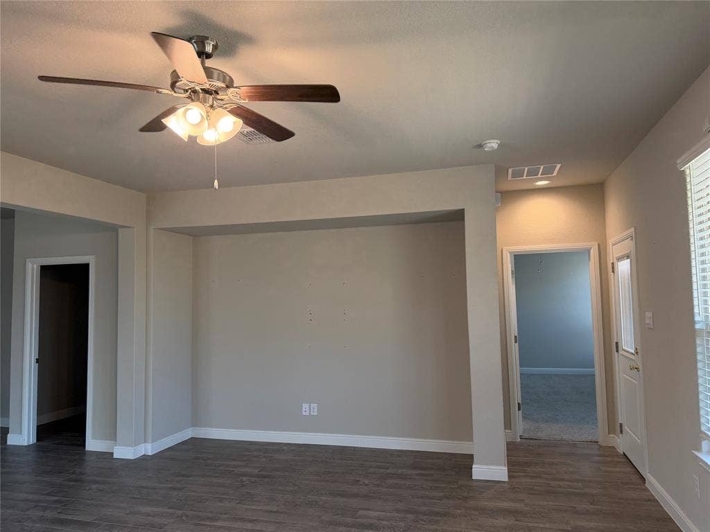 5213 Meadow Lane, Krum, TX 76249 Wood-finish flooring, ceiling fan with integrated lighting, recessed lighting, white window blinds, and neutral wall tones