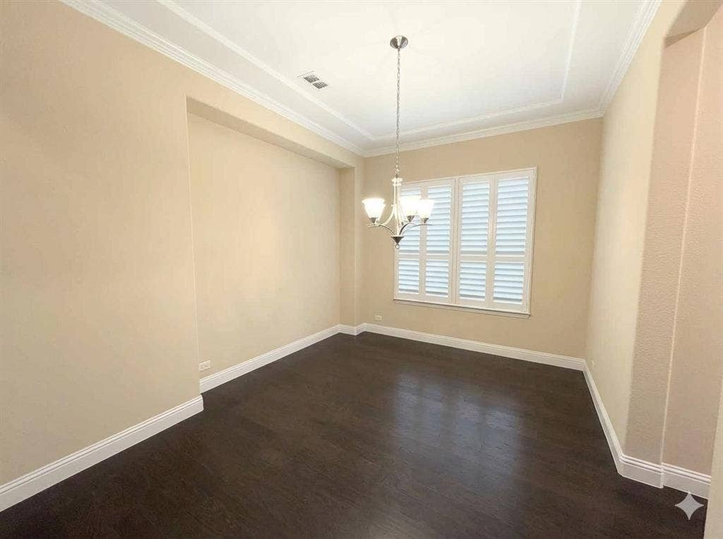 5917 Trantina Lane, Frisco, TX 75035 Dark wood-finish flooring with white baseboards