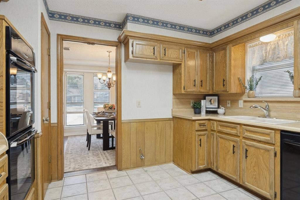 1721 Guildford Street, Garland, TX 75044 The kitchen leads directly into the dining room.