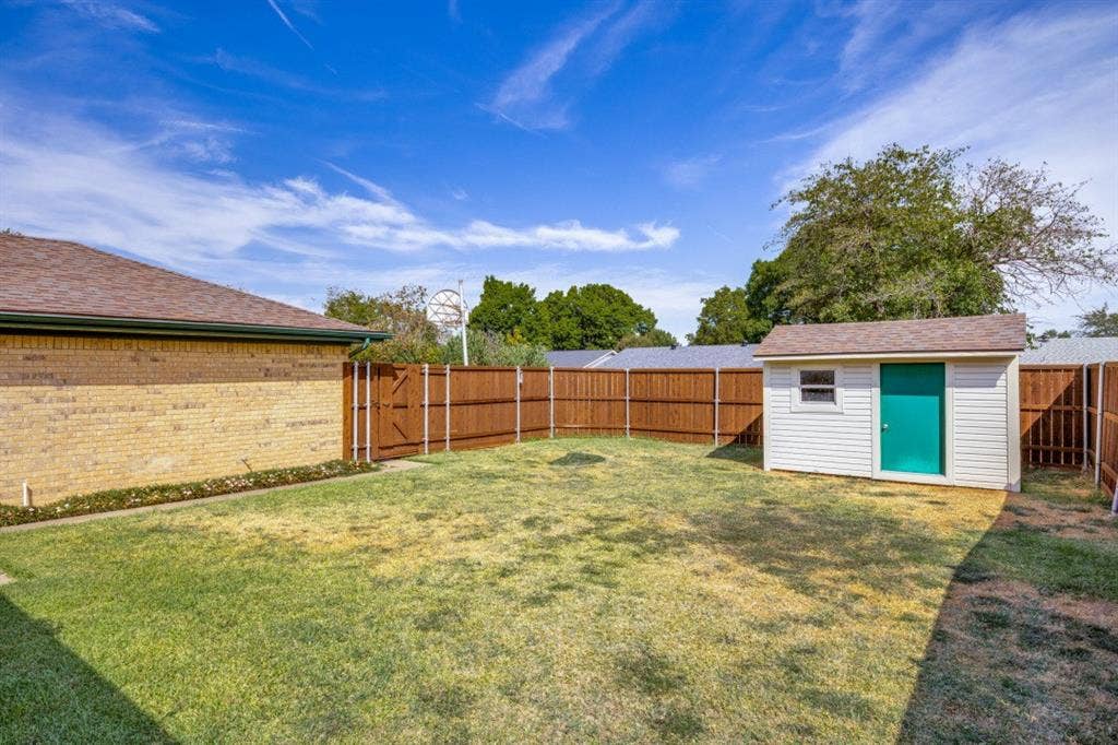 1721 Guildford Street, Garland, TX 75044 Nice wood fence encloses the perfect sized backyard!