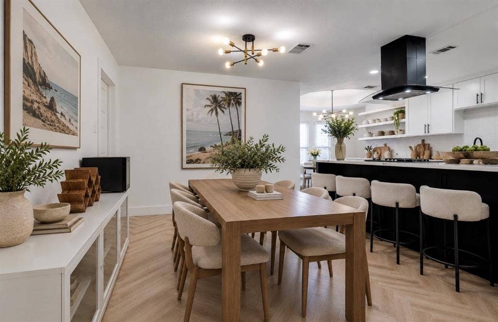 171 Wildwood Drive, DeSoto, TX 75115 Open dining area with contemporary lighting and convenient access to the kitchen.