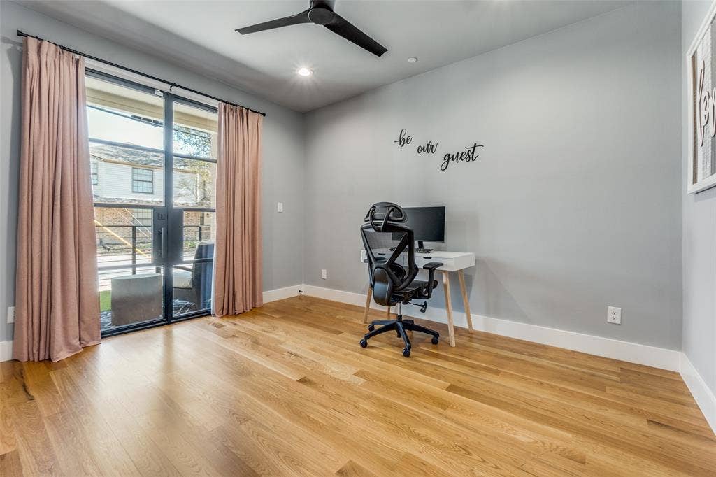 805 Pavillion Street, #103, Dallas, TX 75204 Wood-finish flooring with white trim