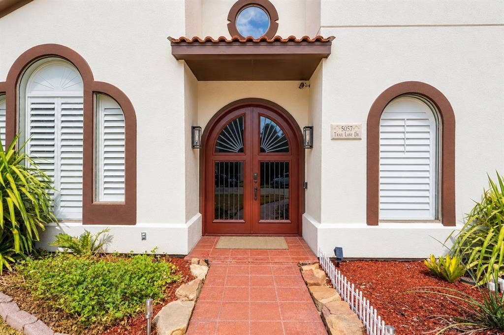 5057 Trail Lake Drive, Plano, TX 75093 Elegant arched entry