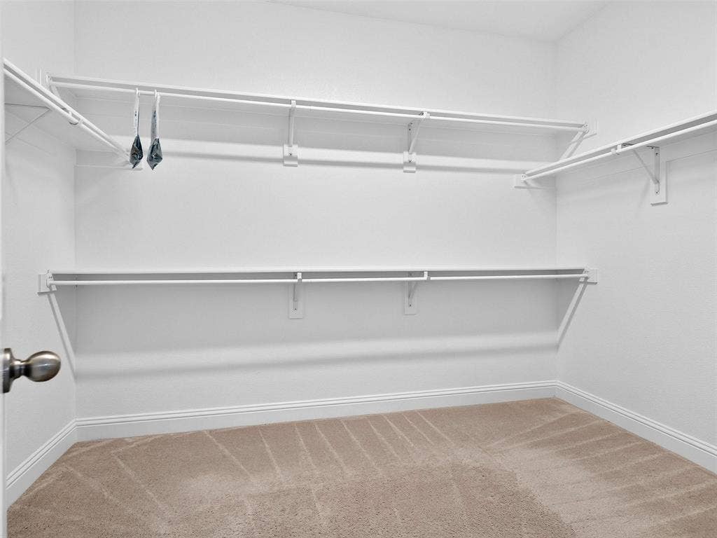 6504 Dynamite Drive, McKinney, TX 75070 Wall-mounted wire shelving and hanging rods
