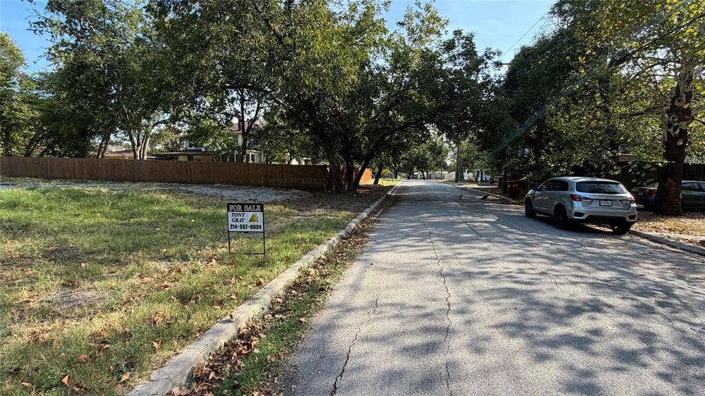 307 S Rike Street, Farmersville, TX 75442 Level lot with mature trees and a wooden privacy fence