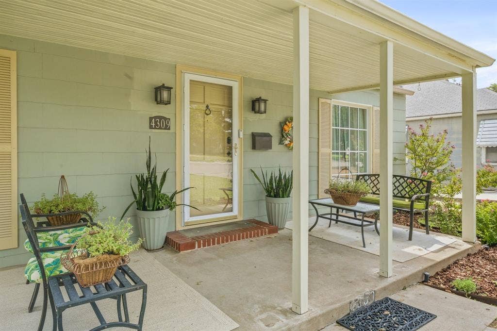 Covered porch where you can enjoy your morning coffee or unwind in the evenings.