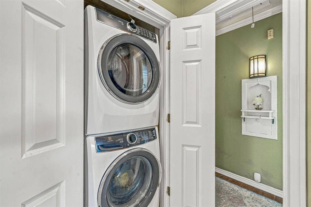 Laundry closet located in kitchen.