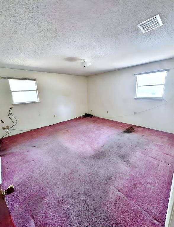 148 Crockett Lane, Hewitt, TX 76643 Generously sized 15' x 14"5" primary bedroom with natural light and wonderful potential to create a personalized retreat.