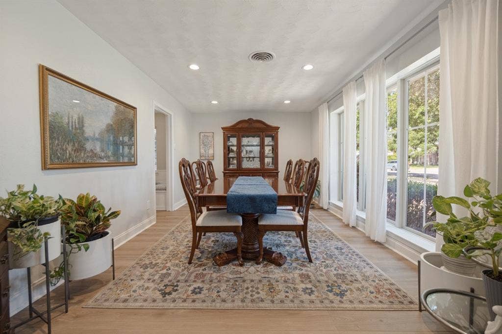 Dining Room is HUGE - 19'x11' with a wall of windows & is great for entertaining.