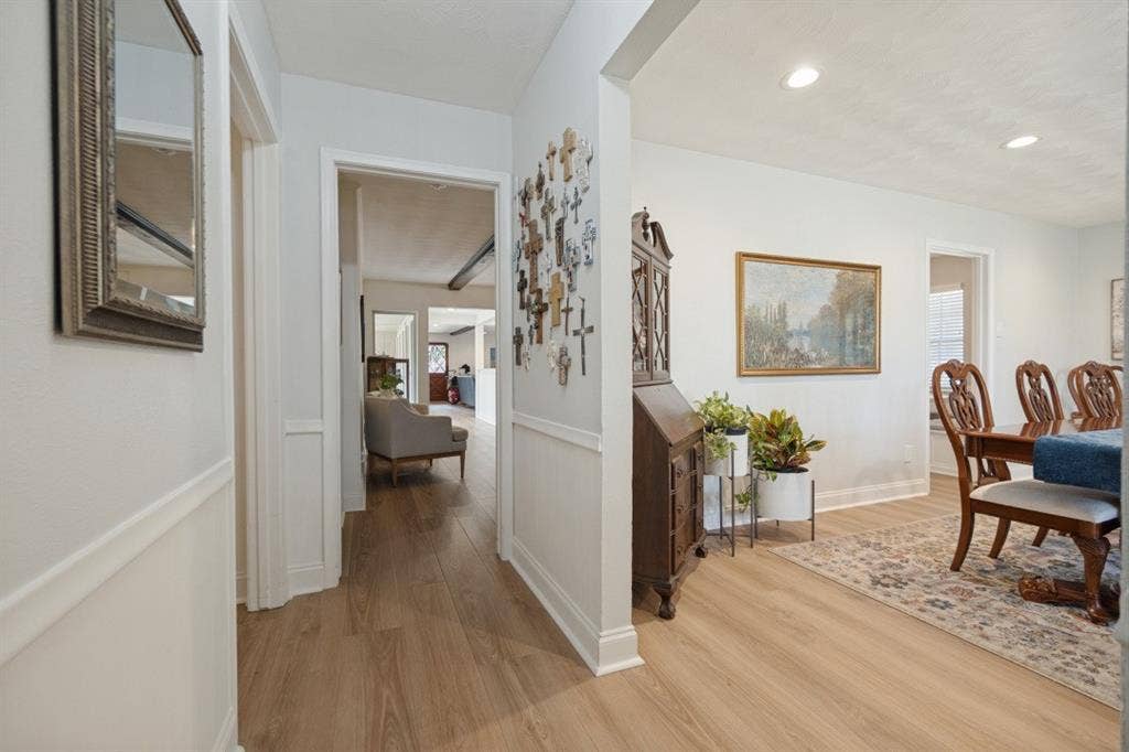Luxury Vinyl Plank floors from the front door to back door & throughout the home, except bathrooms.