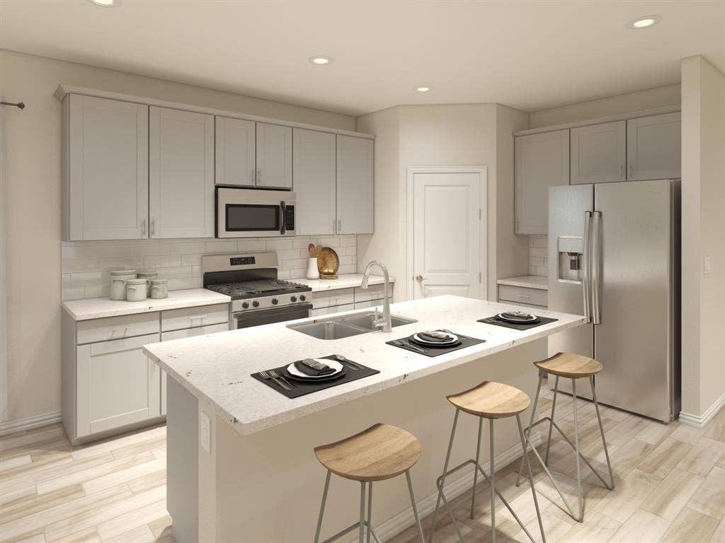 13227 Piney Woods Drive, Rowlett, TX 75089 Photo is not of the actual home, but is an inspirational photo of builder’s model home and may depict options, furnishings, and/or decorator features that are not included.