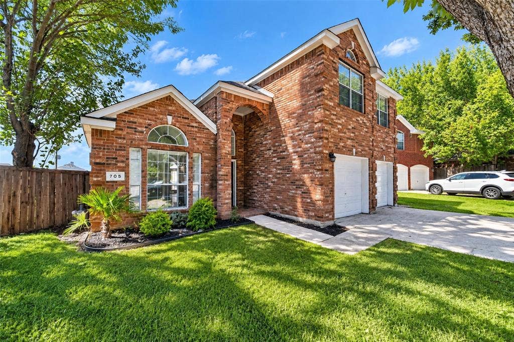 705 N Jordan Road, McKinney, TX 75071 Brick exterior with architectural archway entry
