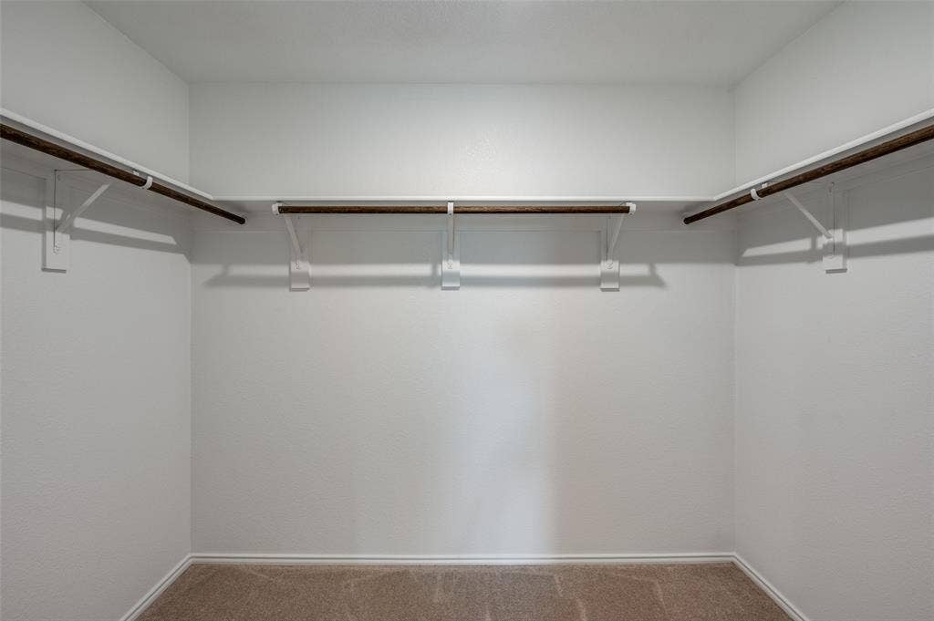 1708 Sims Street, McKinney, TX 75071 Spacious closet with carpet