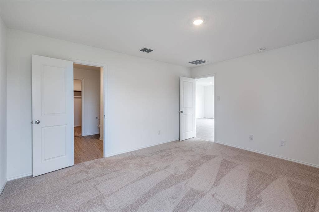 1708 Sims Street, McKinney, TX 75071 View of carpeted spare room
