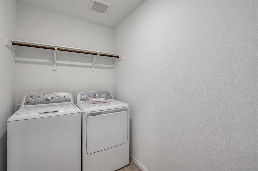 1708 Sims Street, McKinney, TX 75071 Laundry room with separate washer and dryer