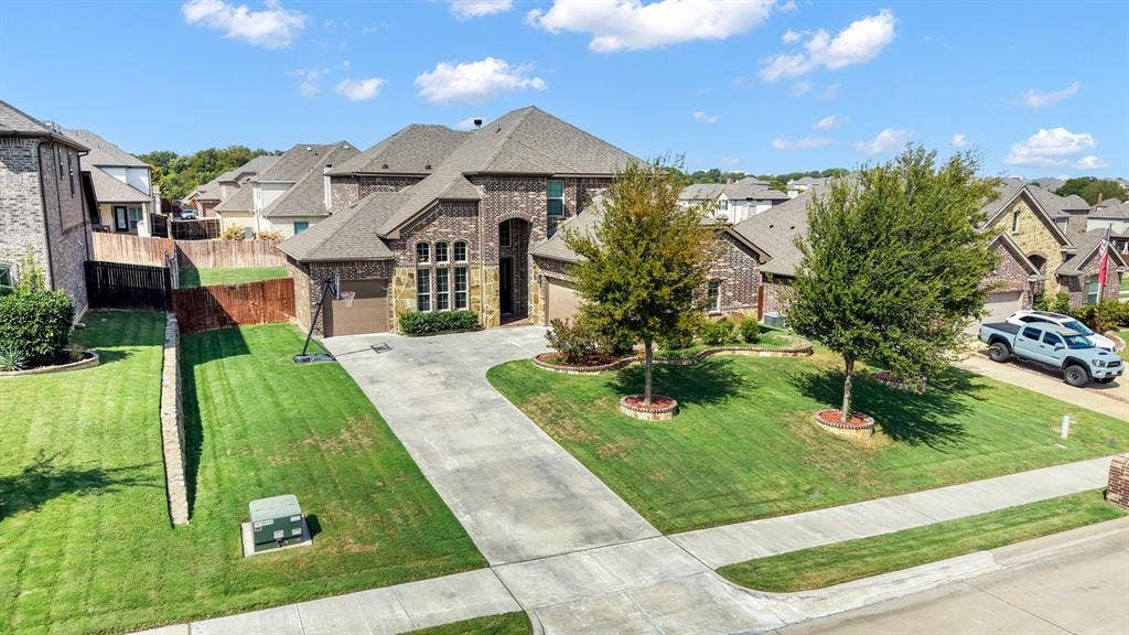 3605 Barby Court, Midlothian, TX 76065 Brick and stone exterior with a multi-gabled roof