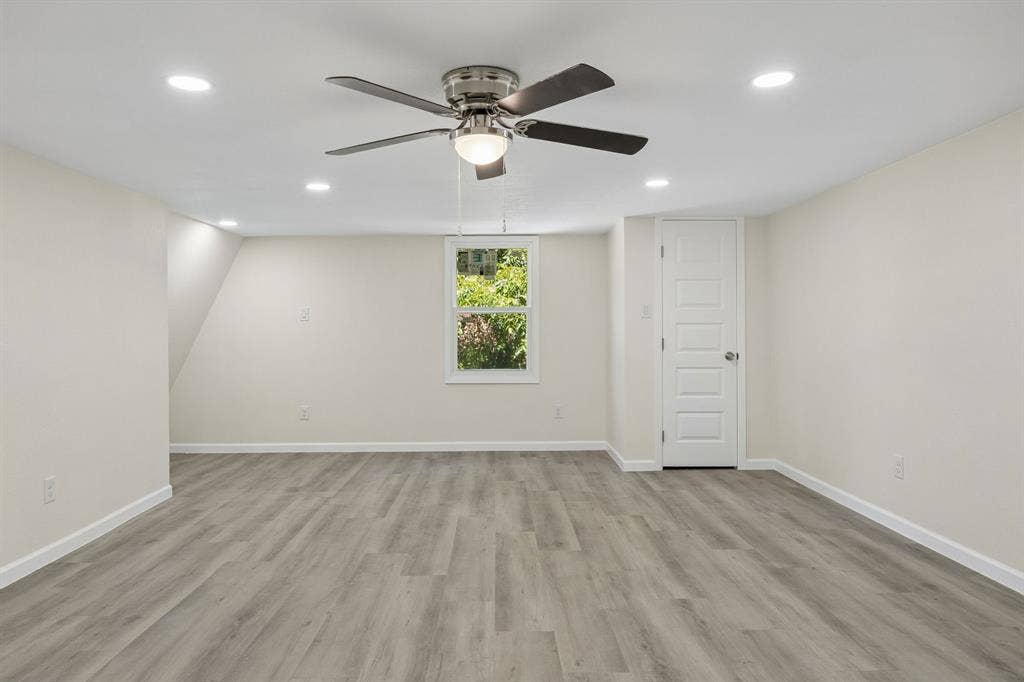 Completely renovated insulated garage flex space w/ new roof, windows , flooring lighting and more.