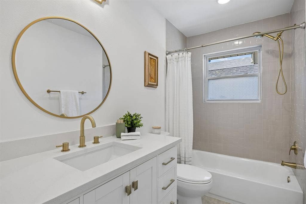 Secondary bathroom completely renovated and designed to maximize the space.  Lots of storage here