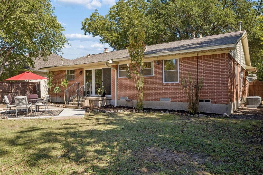 Grass is beginning to grow after the hot summer and all the renovations!  Large private backyard with 6 foot fence and plenty of room to garden