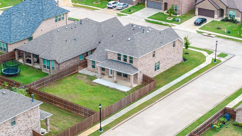 405 Rosie Court, Argyle, TX 76226 Aerial view of this Argyle ISD home showcasing its oversized corner lot, expansive backyard, spacious lot, and exceptional curb appeal.