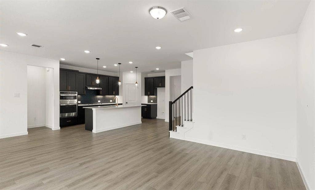 Open Kitchen-Living Room Representative Photo featuring the Noir Collection