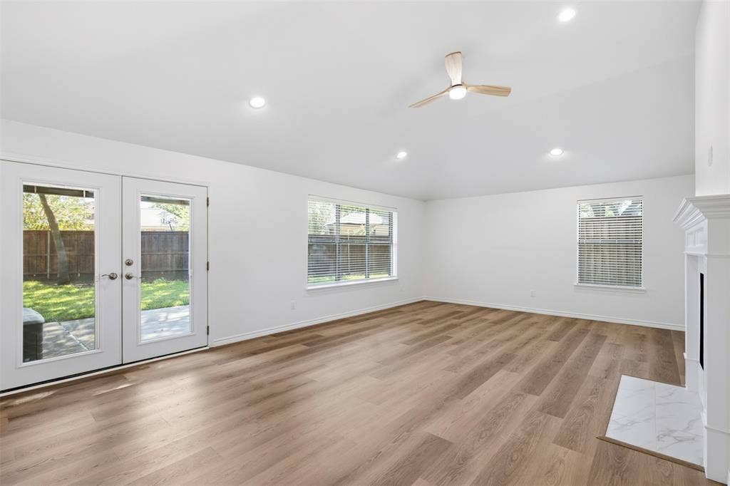 661 Thompson Drive, Coppell, TX 75019 Vaulted ceiling with recessed lighting and a ceiling fan