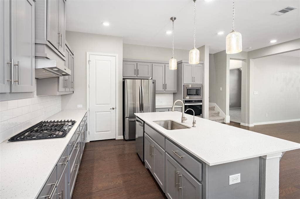 1015 Permian Lane, Allen, TX 75013 Kitchen with Gas Cooking and Draft