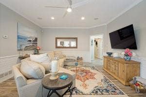 5212 Mustang Trail, Plano, TX 75093 Wood-finish flooring with crown molding and wainscoting