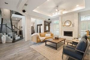 5212 Mustang Trail, Plano, TX 75093 White-painted brick fireplace with a built-in firebox