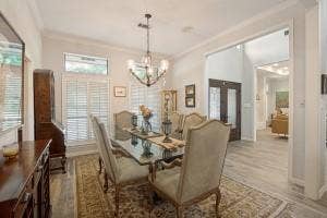 5212 Mustang Trail, Plano, TX 75093 Recessed lighting, wood-finish flooring, and white plantation shutters