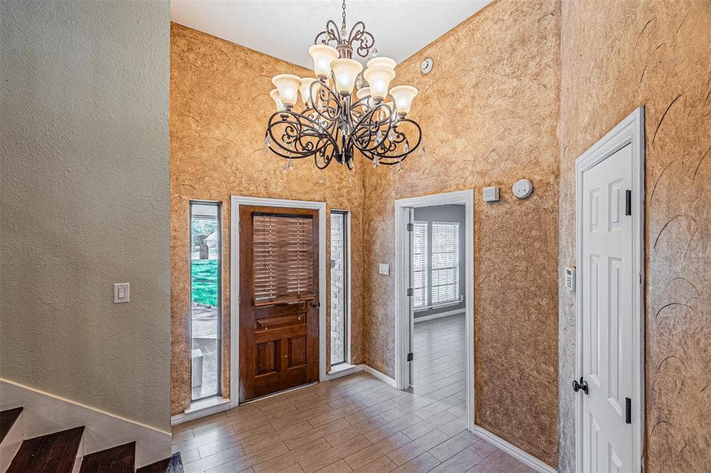 8808 Sylvan Court, Fort Worth, TX 76120 Tile flooring with wood-look plank design