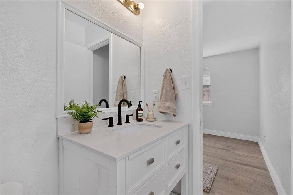 1512 Bay Shore Drive, Garland, TX 75040 Virtually staged bathroom