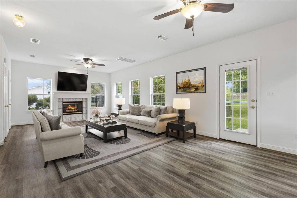 1609 Blackburn Road, Sachse, TX 75048 Virtually Staged 27x14 Living Room. The area could have multiple seating arrangements!