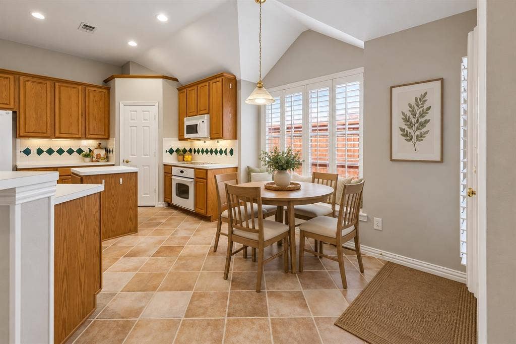 Dining nook off kitchen - Digitally Staged