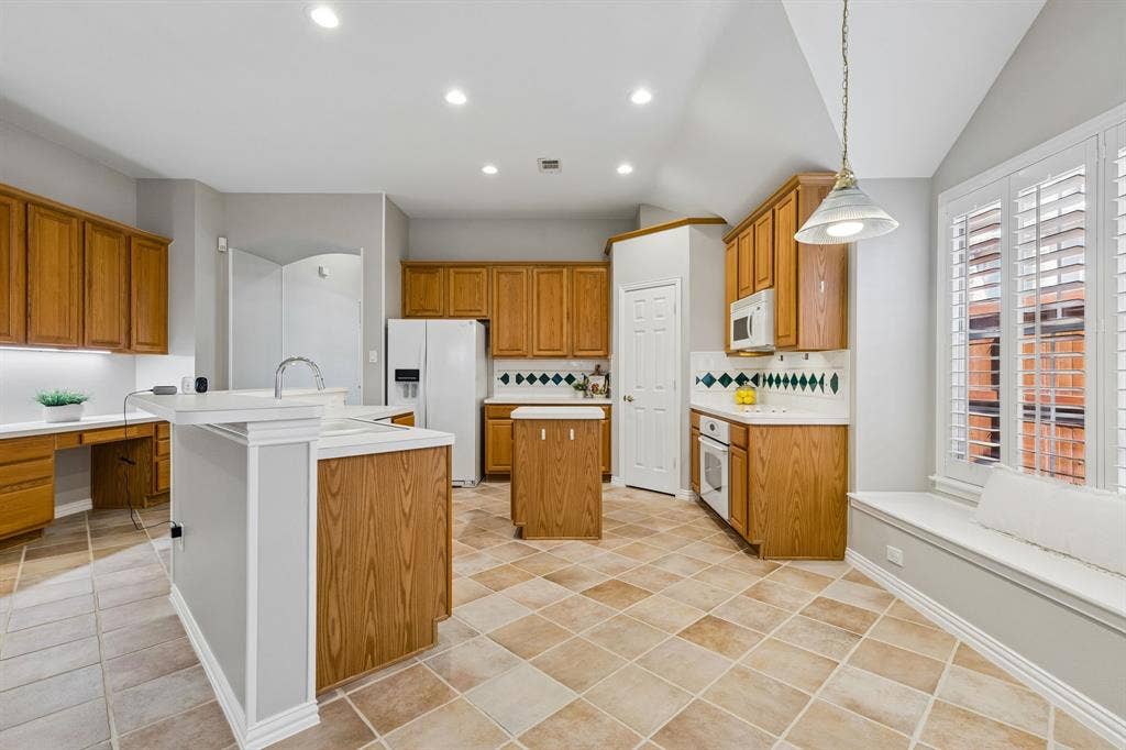Plenty of counter space with built-in desk area