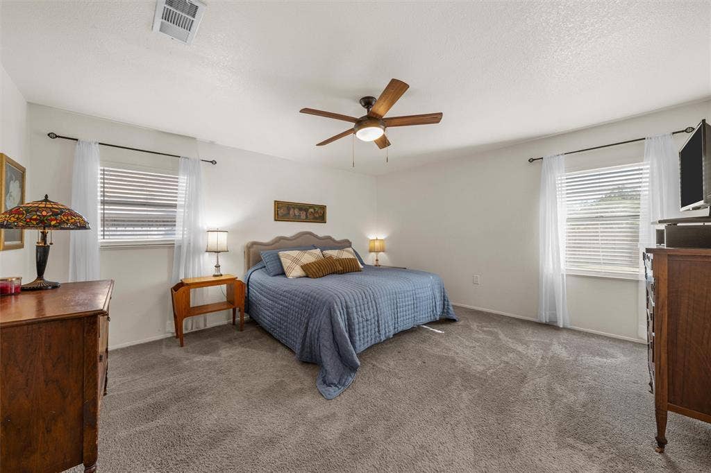 1712 Laurel Lake Drive, Waco, TX 76710 Neutral wall tones with installed ceiling fan