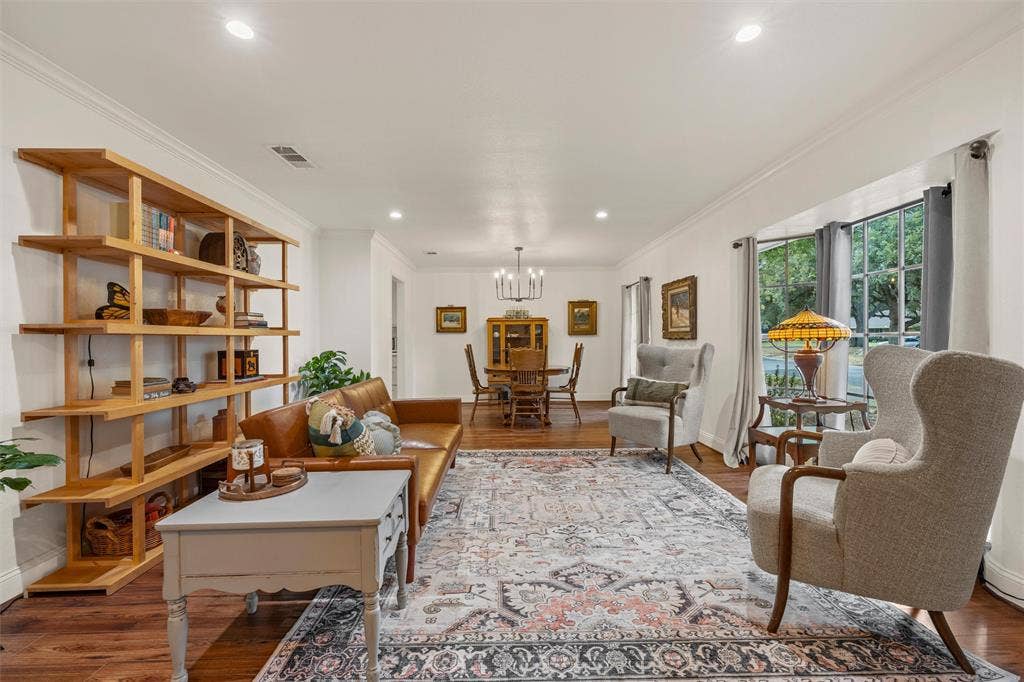 1712 Laurel Lake Drive, Waco, TX 76710 Recessed lighting, wood-finish flooring, a built-in shelving unit, a dining area, and a bay window