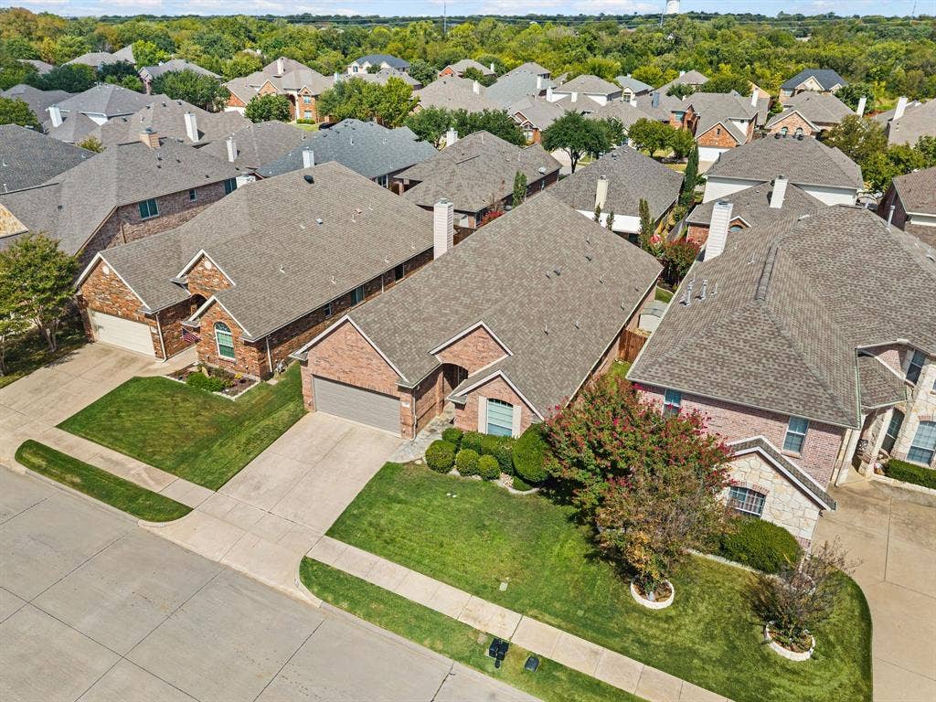 307 Park Haven Boulevard, Euless, TX 76039 Brick and stone exterior with a gabled roof