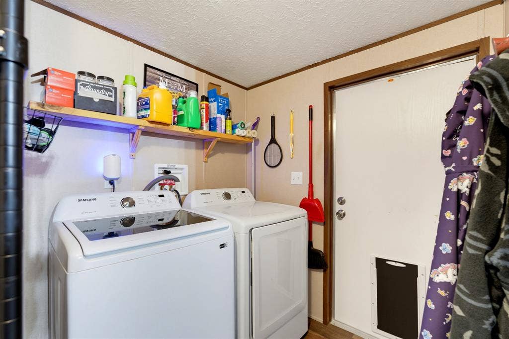 Laundry area with room for deep freezer