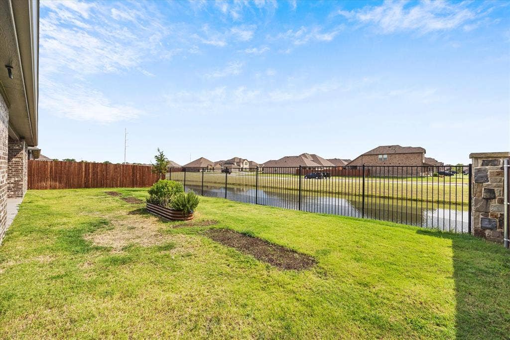 164 Mapleoak Drive, Caddo Mills, TX 75135 Private backyard overlooking community canal