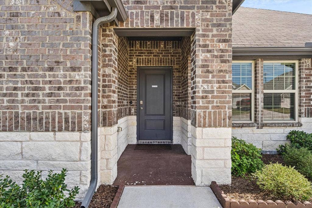 164 Mapleoak Drive, Caddo Mills, TX 75135 Charming covered entry