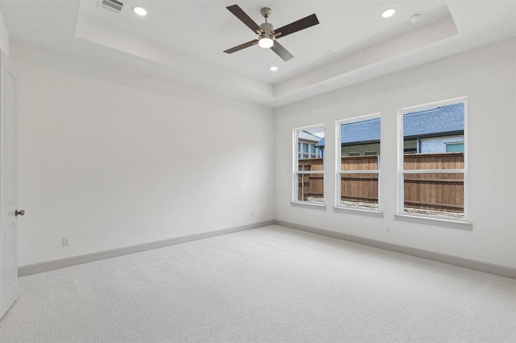 Located at the rear of the home for additional privacy, this owner's suite was designed for rest and relaxation.
