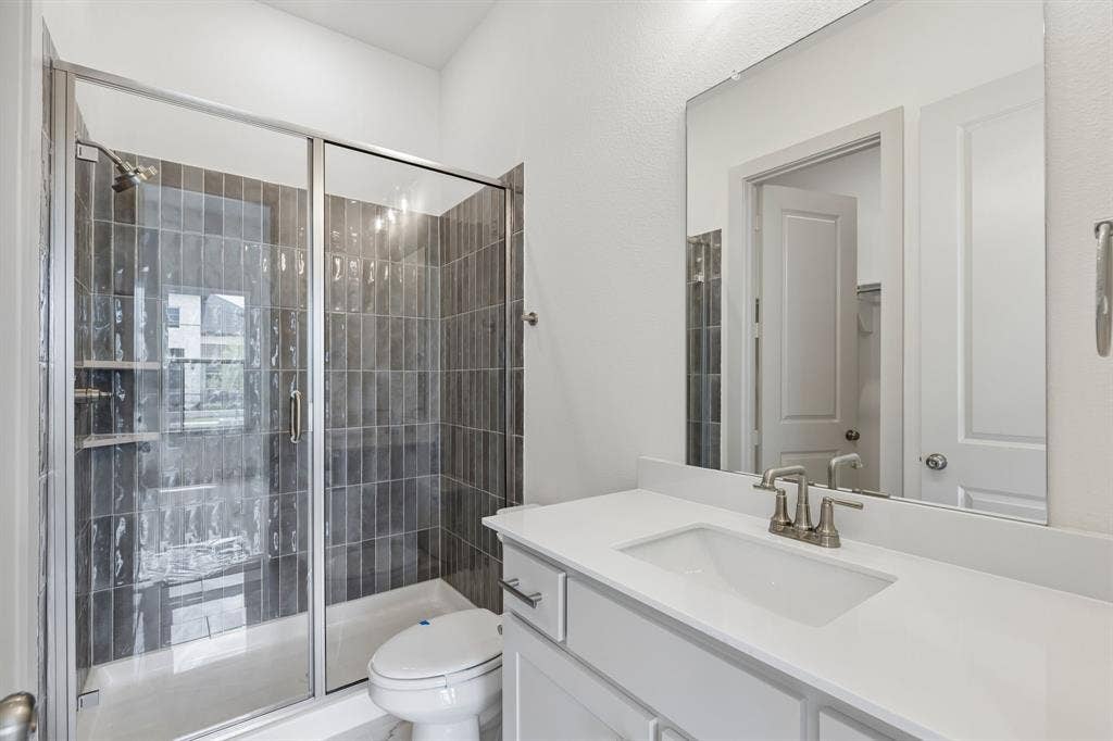 Friends and family will feel right at home in any of the beautifully finished guest baths.