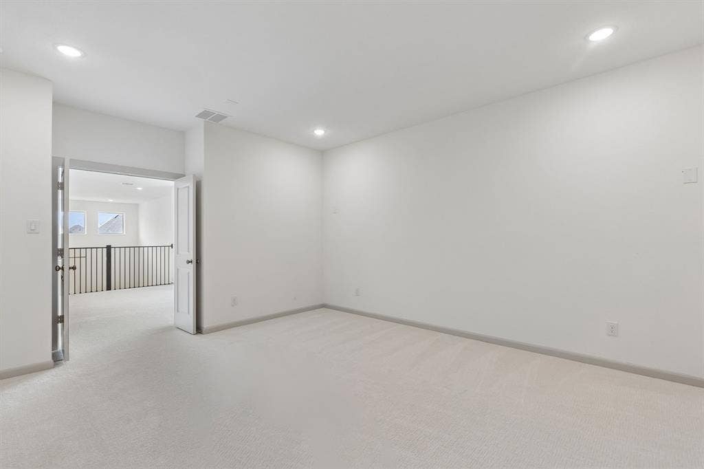 The spacious media room paired with adjacent game room creates the ultimate family entertainment zone!