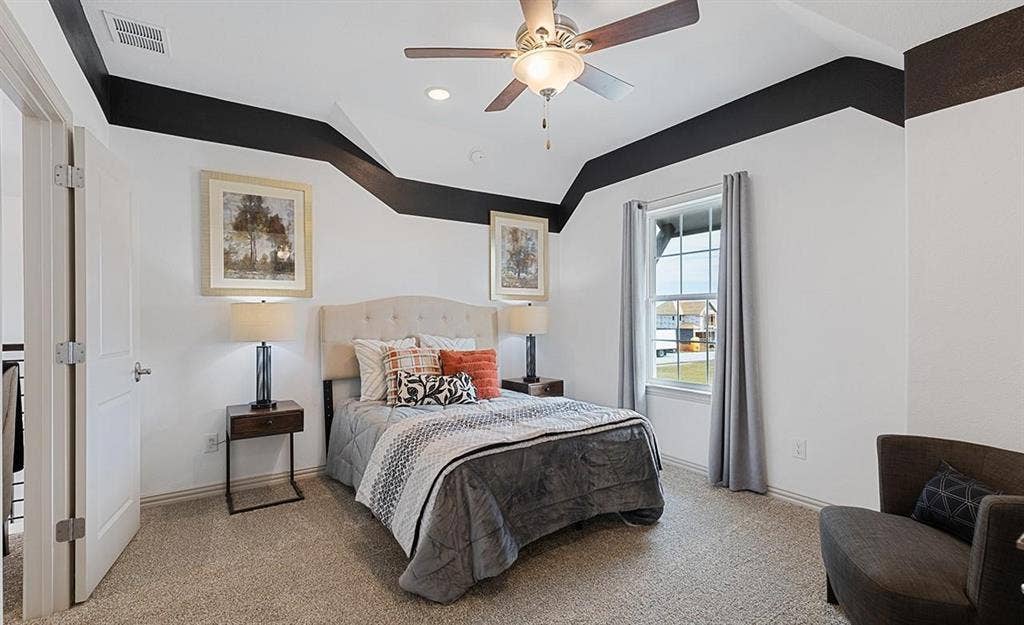 1456 Kit King Drive, Little Elm, TX 75036 Tray ceiling with recessed lighting and a ceiling fan, window with white framing, and neutral carpeting