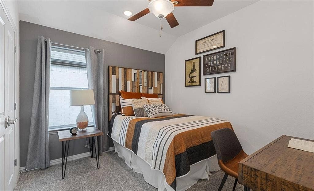 1456 Kit King Drive, Little Elm, TX 75036 Angled vaulted ceiling with a ceiling fan, recessed lighting, and a window with blinds