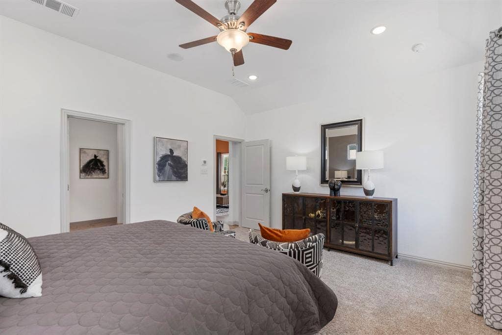 1456 Kit King Drive, Little Elm, TX 75036 Vaulted ceiling with a ceiling fan, recessed lighting, and carpet flooring