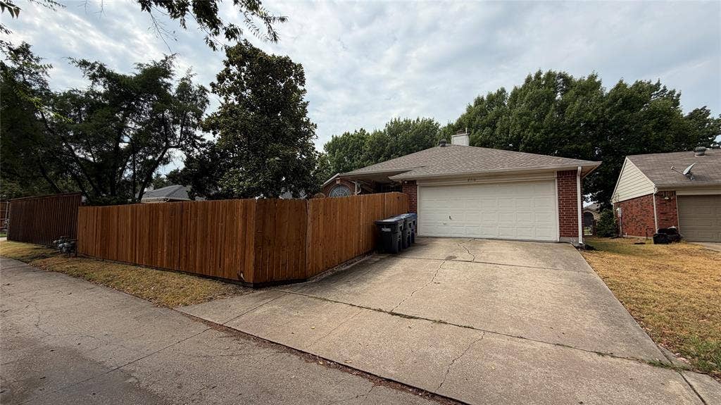2718 High Pointe Boulevard, McKinney, TX 75071 Single-story residence featuring brick accents and an attached garage