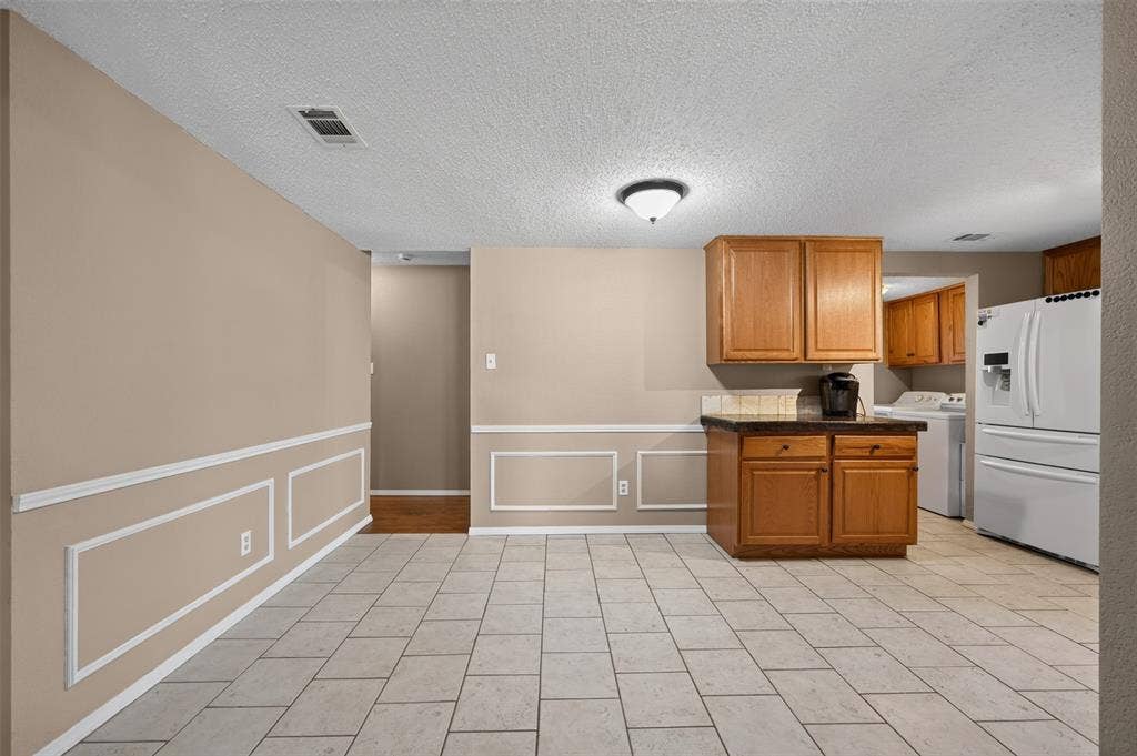 203 Briarglen Drive, Cedar Hill, TX 75104 Tiled flooring with a rectangular pattern